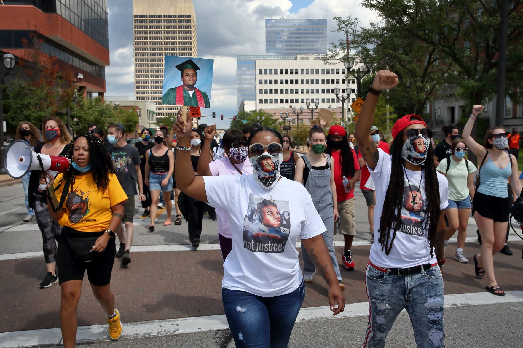 Protesters march for Michael Brown, call for charges against Darren Wilson